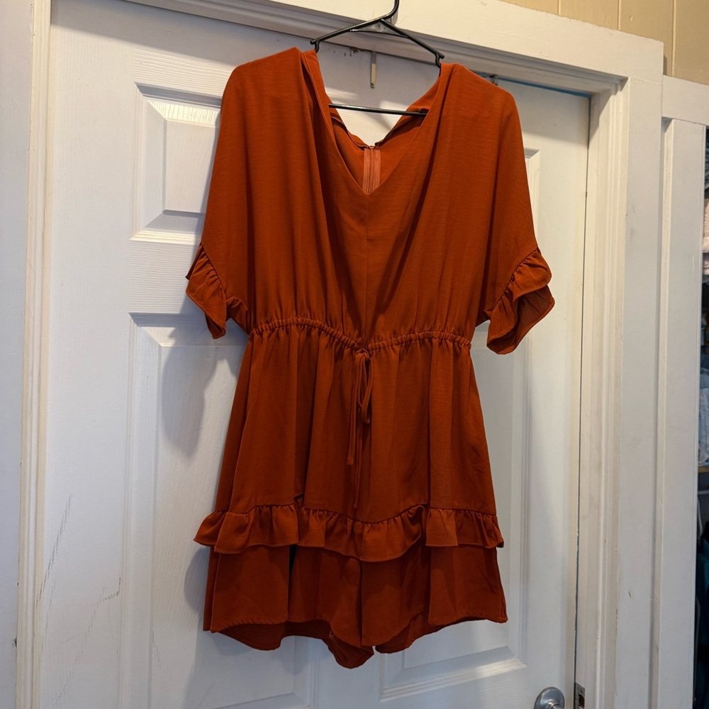 Dark orange romper short sleeve with ruffle detail
